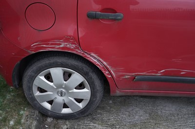 Lot 329 - A Nissan Note Visia red petrol car