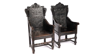 Lot 983 - Two 19th Century carved and ebonised oak wainscot style chairs