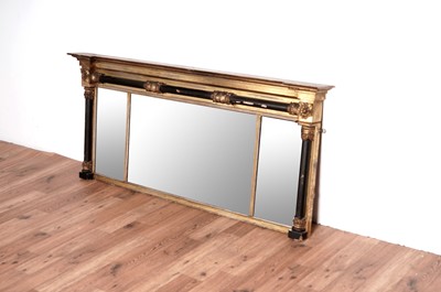 Lot 41 - A 19th Century gilt and ebonised overmantel mirror, with Lloyd label