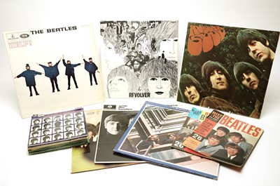 Lot 549 - A collection of LPs and 7" singles and EPs by The Beatles