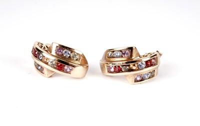 Lot 431 - A coloured gem stone set ring and earrings