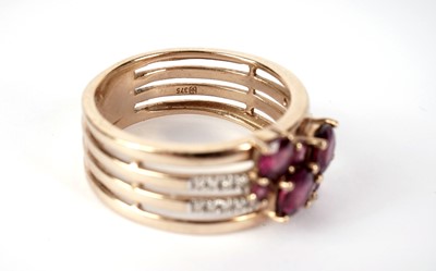 Lot 436 - A purple stone and diamond dress ring