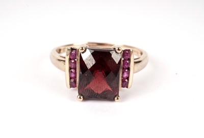 Lot 437 - Two red stone  dress rings