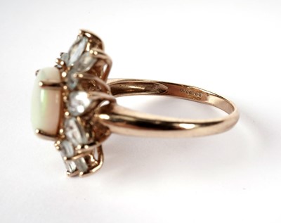 Lot 439 - An opal and blue stone cluster ring