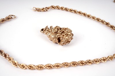 Lot 450 - Two gold chains and a pendant