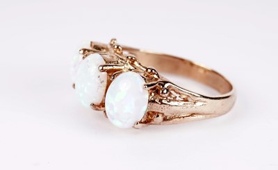 Lot 499 - A 9ct yellow gold and synthetic opal dress ring