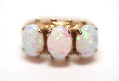 Lot 499 - A 9ct yellow gold and synthetic opal dress ring