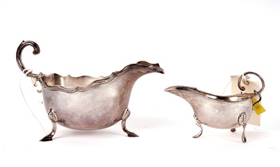 Lot 401 - Two silver sauce boats and a silver sugar caster