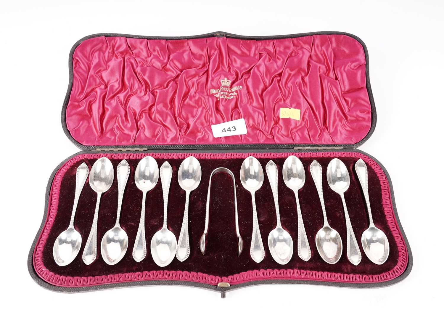 Lot 443 - A cased set of twelve silver teaspoons and tongs