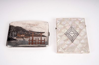 Lot 458 - A Victorian mother of pearl card case; and a Japanese silver cigarette case