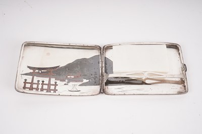 Lot 458 - A Victorian mother of pearl card case; and a Japanese silver cigarette case