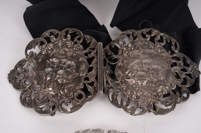Lot 456 - An Edwardian silver belt buckle; and two others