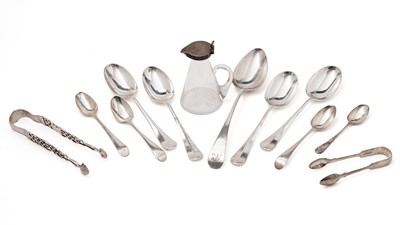 Lot 335 - A mixed lot of spoons, tablespoons, tongs and a whisky tot