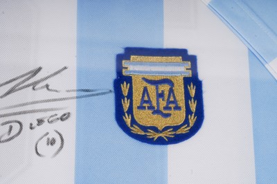 Lot 745 - An Argentina World Cup replica football shirt signed by Maradona