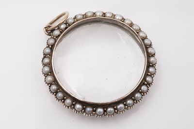 Lot 410 - A Victorian seed pearl and gold picture pendant