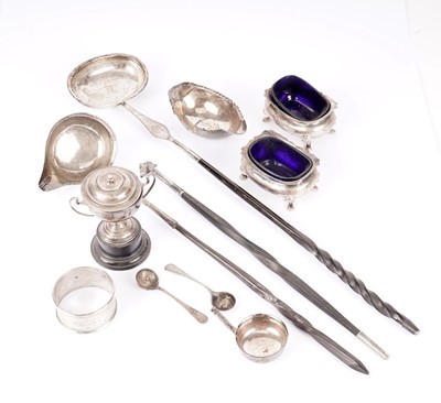 Lot 502 - A selection of silver and white metal toddy ladles, napkin rings and condiments