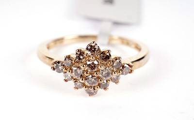 Lot 510 - A champagne diamond ring