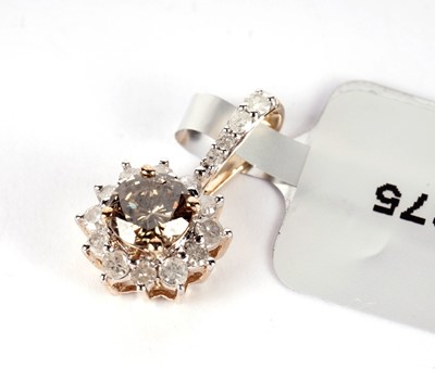 Lot 520 - A champagne diamond pendant