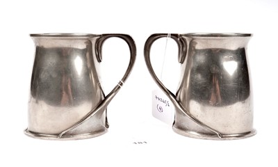 Lot 181 - A pair of Tudric Pewter tankards