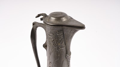 Lot 200 - An Art Nouveau pewter claret jug