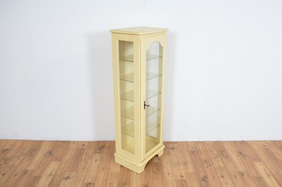 Lot 44 - A contemporary glazed display cabinet of upright form
