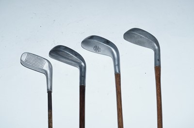 Lot 262 - A selection of hickory shafted vintage golf clubs
