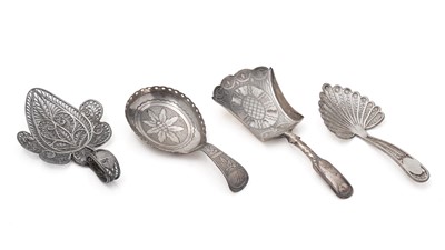 Lot 258 - Two George III filigree caddy spoons