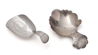 Lot 274 - A George III caddy spoon and another