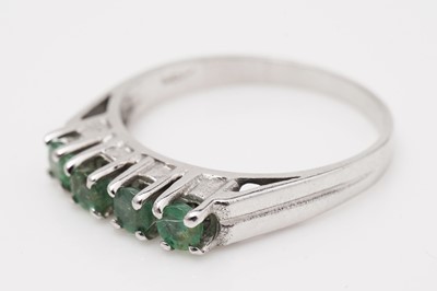 Lot 464 - A four stone emerald ring