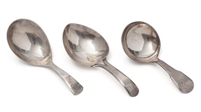 Lot 285 - Two George III caddy spoons and another