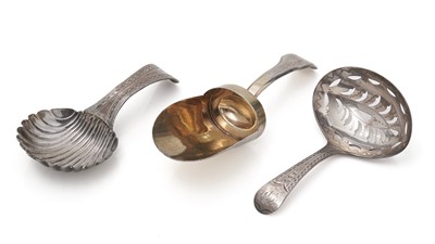 Lot 305 - A rare double duty mark caddy scoop and two caddy spoons