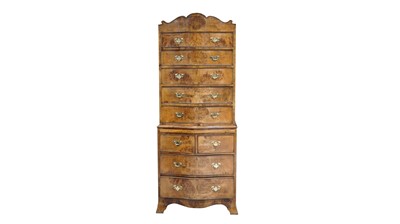 Lot 988 - A burr walnut and walnut serpentine chest on chest, late 19th/20th Century