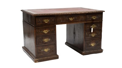 Lot 33 - A Victorian carved oak desk