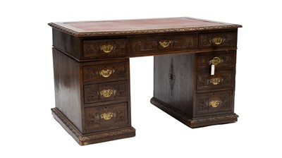 Lot 996 - A Victorian carved oak desk