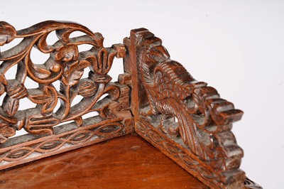 Lot 1002 - A large Ango Indian teak davenport