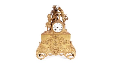 Lot 866 - An ornate 19th Century French gilt metal mantel clock