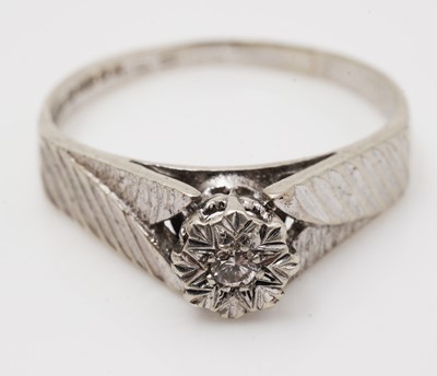 Lot 467 - Three diamond rings and another
