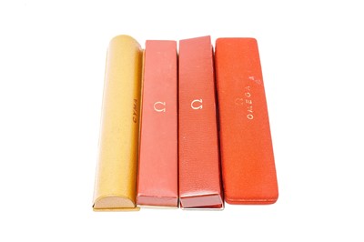 Lot 1026 - Three Omega cocktail watch boxes; and one by Cyma