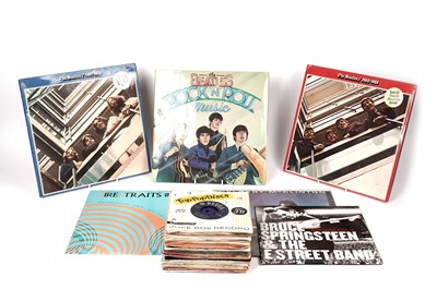 Lot 560 - A collection of mixed LPs and 7" singles