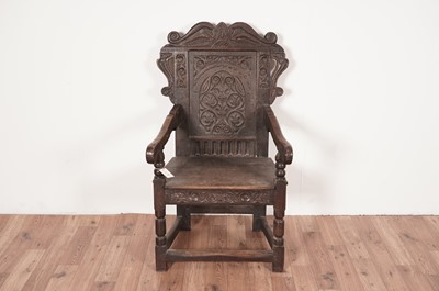 Lot 19 - A Victorian oak wainscot chair