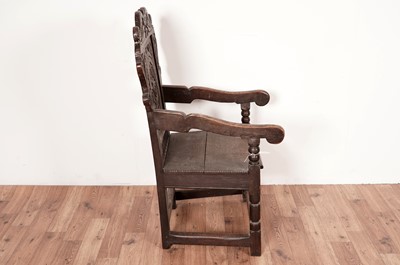Lot 19 - A Victorian oak wainscot chair