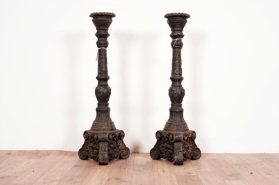 Lot 27 - A pair of cast iron candlesticks