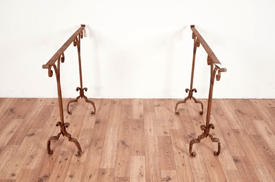 Lot 24 - A wellington boot/shoe stand; and a pair of Victorian table supports