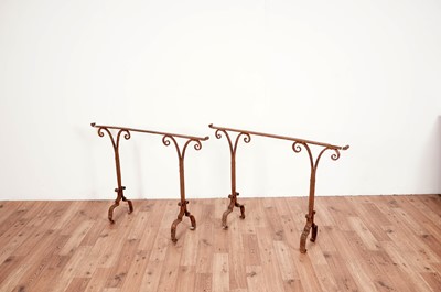 Lot 24 - A wellington boot/shoe stand; and a pair of Victorian table supports