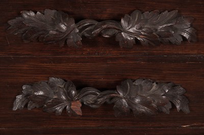 Lot 62 - A Victorian carved oak wellington chest.