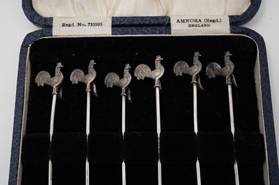 Lot 477 - A set of six silver cocktail sticks