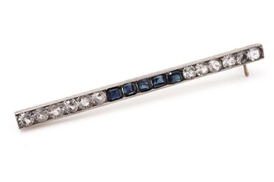 Lot 359 - A white sapphire and sapphire bar brooch