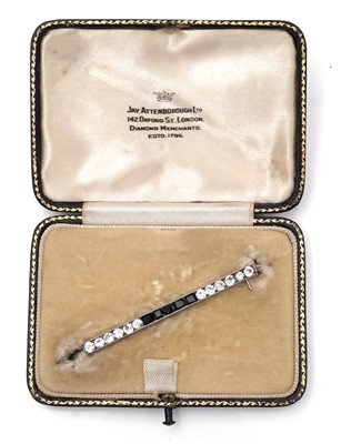 Lot 359 - A white sapphire and sapphire bar brooch