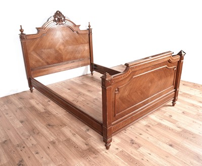 Lot 131 - An Louis XVI style walnut bed