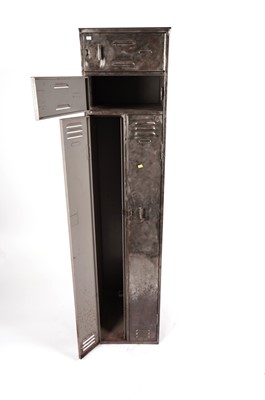 Lot 59 - An industrial polished steel locker cabinet
